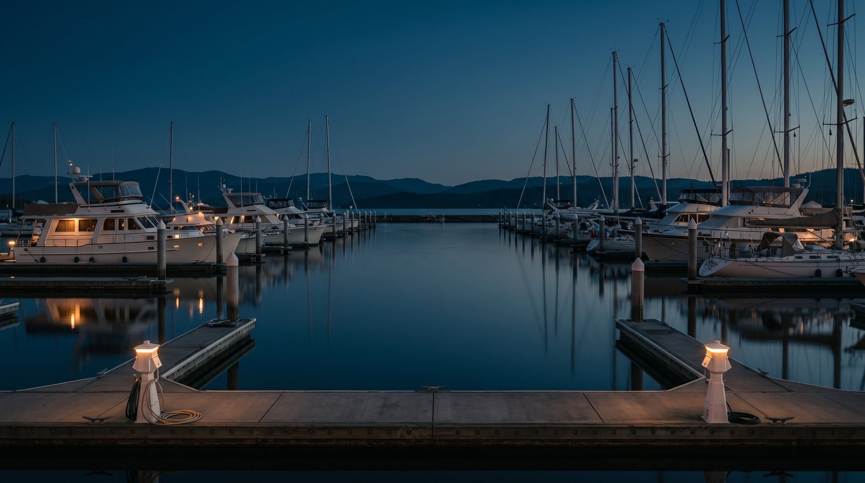 A luxury yacht at a Toronto marina at dusk